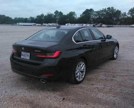 Black 2025 BMW 330 i xDrive