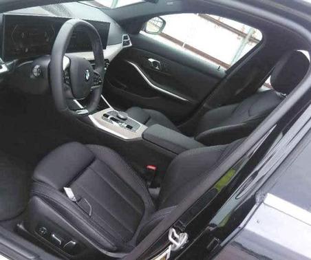 Black 2025 BMW 330 i xDrive