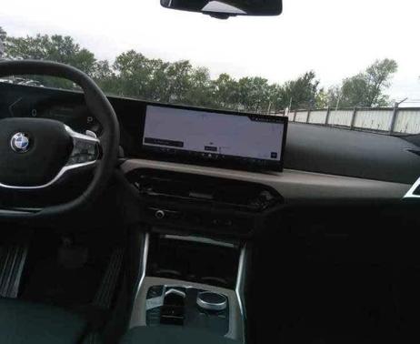 Black 2025 BMW 330 i xDrive