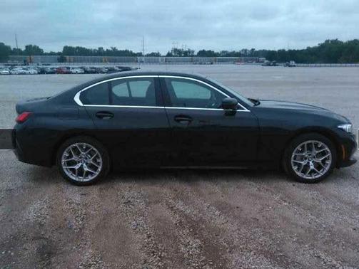 Black 2025 BMW 330 i xDrive