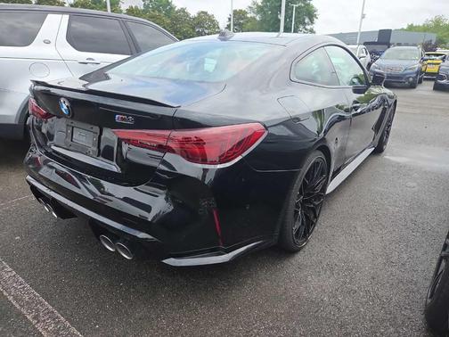 Black Sapphire Metallic 2025 BMW M4 Competition xDrive