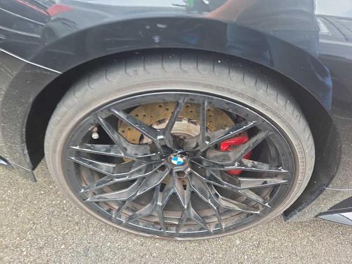 Black Sapphire Metallic 2025 BMW M4 Competition xDrive