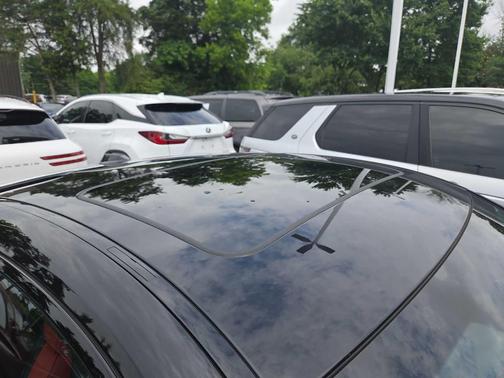 Black Sapphire Metallic 2025 BMW M4 Competition xDrive
