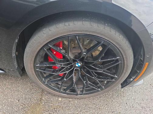 Black Sapphire Metallic 2025 BMW M4 Competition xDrive