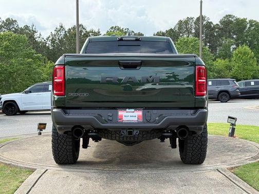 Serrano Green Metallic 2026 RAM 1500 RHO Crew Cab 4x4 5'7' Box