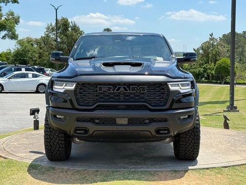 Diamond Black Crystal Pearlcoat 2026 RAM 1500 RHO Crew Cab 4x4 5'7' Box