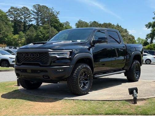 Diamond Black Crystal Pearlcoat 2026 RAM 1500 RHO Crew Cab 4x4 5'7' Box
