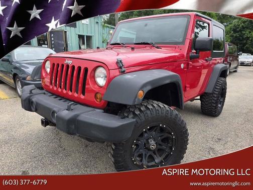 Red 2010 Jeep Wrangler Sport