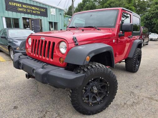 Red 2010 Jeep Wrangler Sport