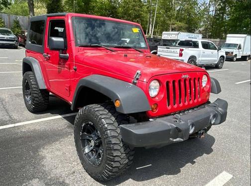 Red 2010 Jeep Wrangler Sport