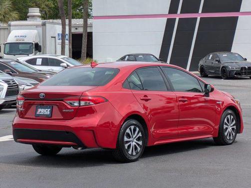 Barcelona Red Metallic 2021 Toyota Corolla Hybrid LE