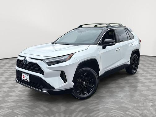 Wind Chill Pearl/Midnight Black Metallic 2024 Toyota RAV4 Hybrid SE