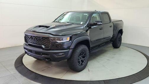 Diamond Black Crystal Pearlcoat 2026 RAM 1500 RHO Crew Cab 4x4 5'7' Box