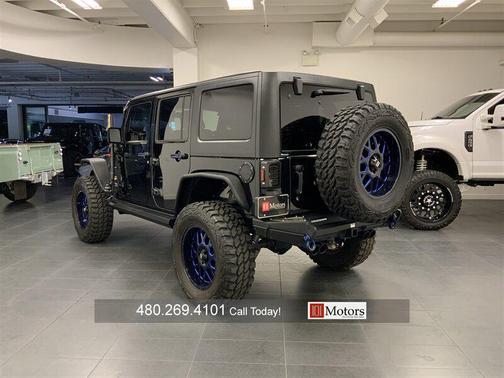 Black 2012 Jeep Wrangler Unlimited Sahara