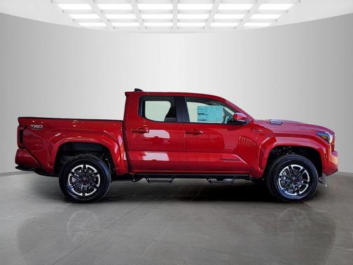 Red 2026 Toyota Tacoma Hybrid TRD Sport