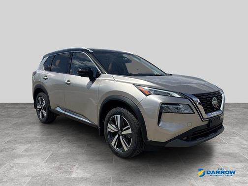 Champagne Silver Metallic/Super Black 2021 Nissan Rogue SL