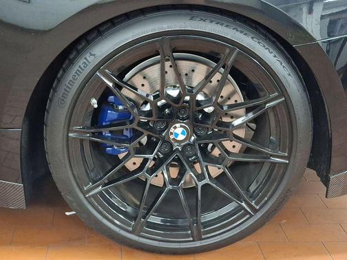 Black Sapphire Metallic 2025 BMW M4 Competition xDrive