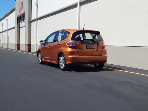 Orange Revolution Metallic 2010 Honda Fit Sport