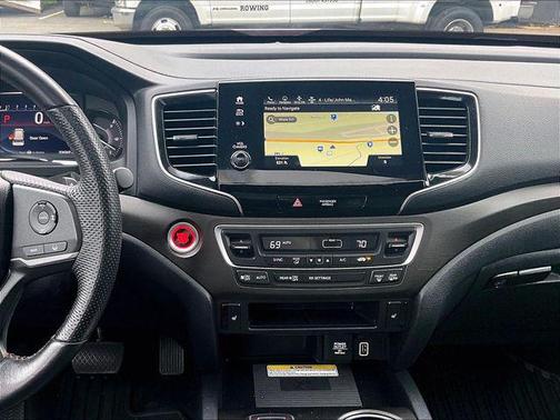 Red 2023 Honda Passport TrailSport