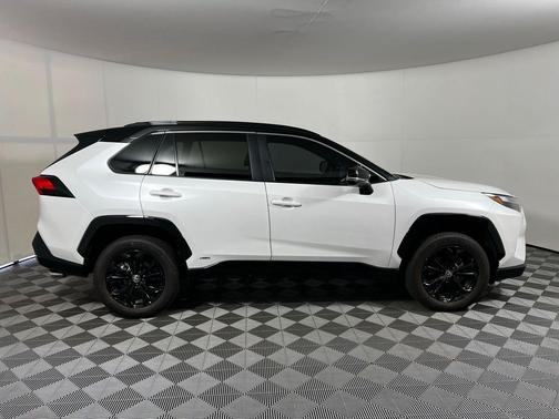 Wind Chill Pearl/Midnight Black Metallic 2023 Toyota RAV4 Hybrid SE