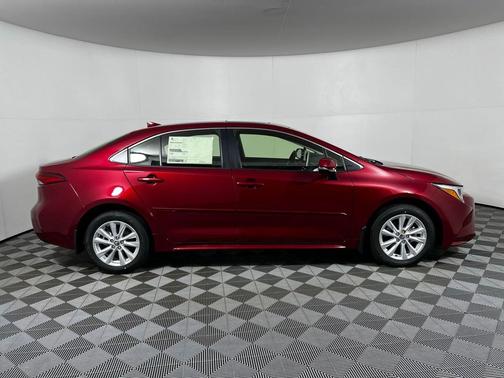 Ruby Flare Pearl 2026 Toyota Corolla Hybrid XLE