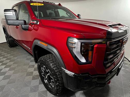 Volcanic Red Tintcoat 2025 GMC Sierra 2500 AT4X