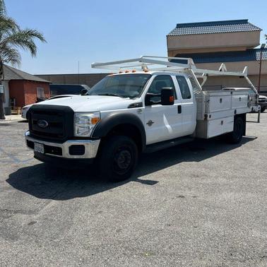 White 2015 Ford F-450 162 W.B. 4D