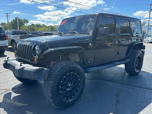Black 2011 Jeep Wrangler Unlimited Sahara