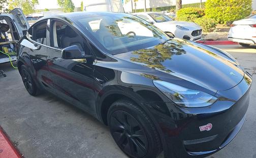Solid Black 2024 Tesla Model Y Long Range Single Motor Rear-Wheel Drive