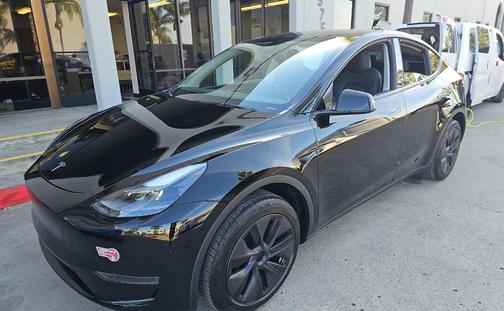 Solid Black 2024 Tesla Model Y Long Range Single Motor Rear-Wheel Drive