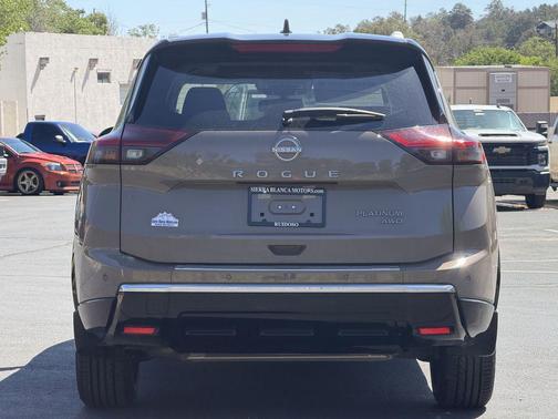 Baja Storm Metallic/Super Black 2024 Nissan Rogue Platinum