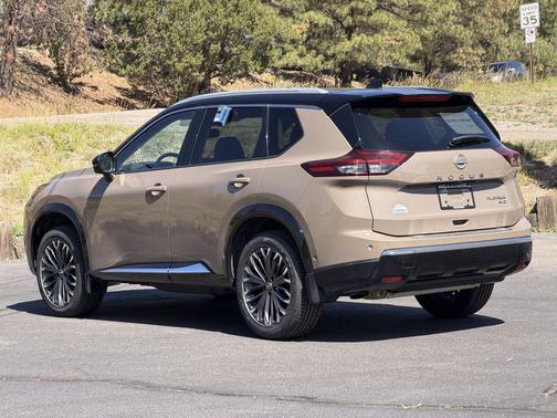 Baja Storm Metallic/Super Black 2024 Nissan Rogue Platinum