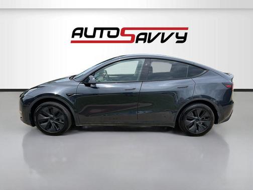 Solid Black 2025 Tesla Model Y Long Range Dual Motor Rear-Wheel Drive