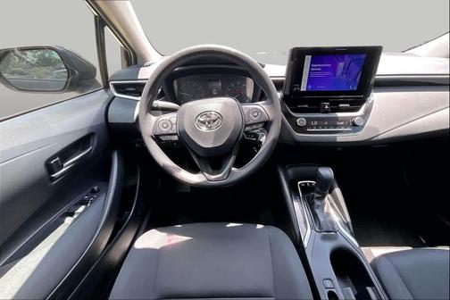 Midnight Black Metallic 2025 Toyota Corolla Hybrid SE