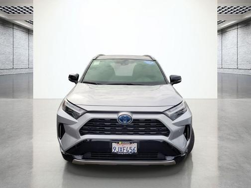 Silver Sky Metallic/Midnight Black Metallic 2024 Toyota RAV4 Hybrid SE