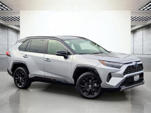 Silver Sky Metallic/Midnight Black Metallic 2024 Toyota RAV4 Hybrid SE