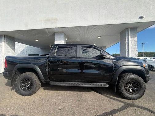Diamond Black Crystal Pearlcoat 2025 RAM 1500 RHO Crew Cab 4x4 5'7' Box
