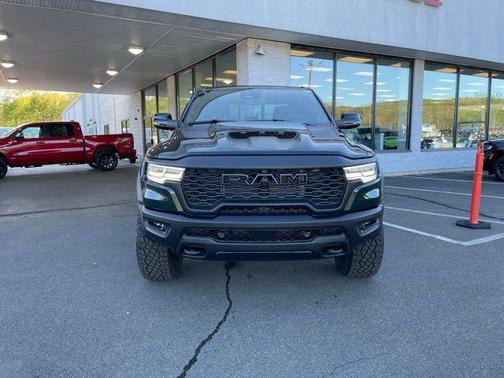 Serrano Green Metallic 2026 RAM 1500 RHO Crew Cab 4x4 5'7' Box