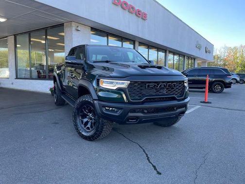 Serrano Green Metallic 2026 RAM 1500 RHO Crew Cab 4x4 5'7' Box