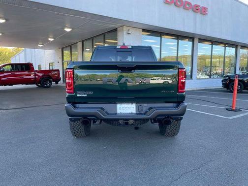 Serrano Green Metallic 2026 RAM 1500 RHO Crew Cab 4x4 5'7' Box