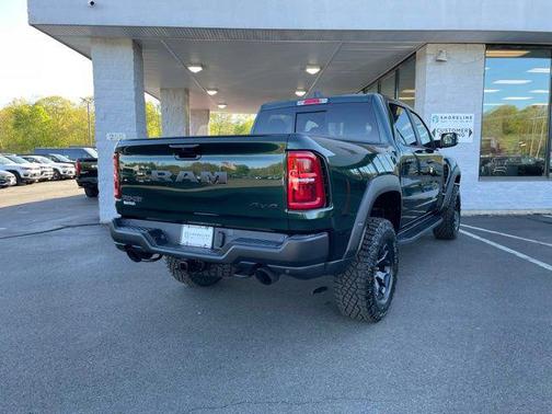 Serrano Green Metallic 2026 RAM 1500 RHO Crew Cab 4x4 5'7' Box