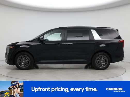 Black 2025 Kia Carnival Hybrid EX