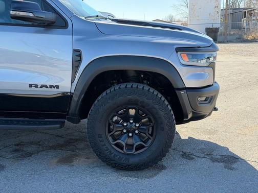 Billet Silver Metallic Clearcoat 2025 RAM 1500 RHO Crew Cab 4x4 5'7' Box