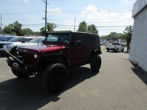 Burgundy 2013 Jeep Wrangler Unlimited Sport
