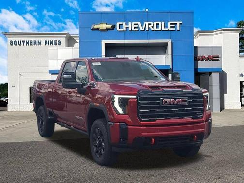 Volcanic Red 2026 GMC Sierra 2500 AT4
