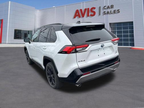 Wind Chill Pearl/Midnight Black Metallic 2024 Toyota RAV4 Hybrid SE