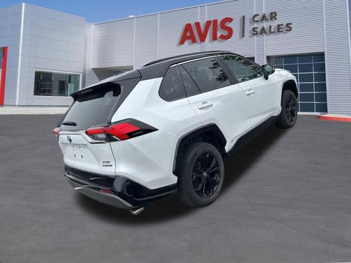 Wind Chill Pearl/Midnight Black Metallic 2024 Toyota RAV4 Hybrid SE