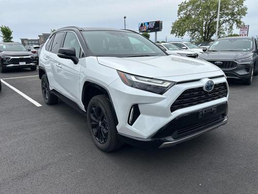Wind Chill Pearl/Midnight Black Metallic 2024 Toyota RAV4 Hybrid SE