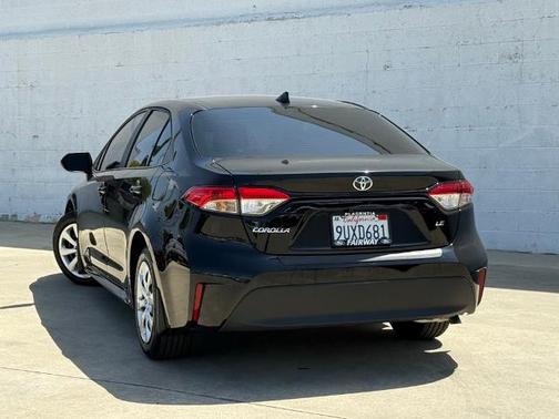 Midnight Black Metallic 2025 Toyota Corolla LE