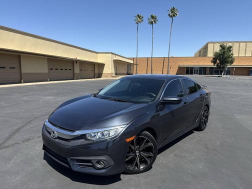 Modern Steel Metallic 2018 Honda Civic LX